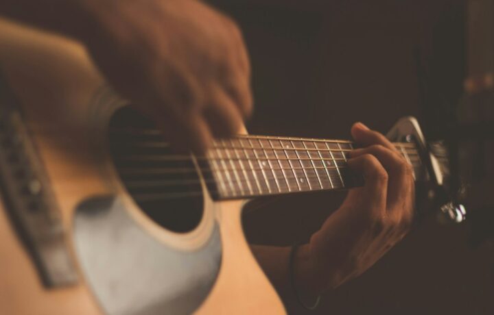 Illustrative acoustic guitar, not a photograph of Rabbi Rubin's youth activities