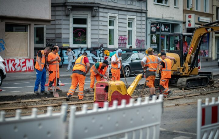 Illustration: daytime road works; not a photograph of the Ben Gurion Boulevard guardrail project in Netanya