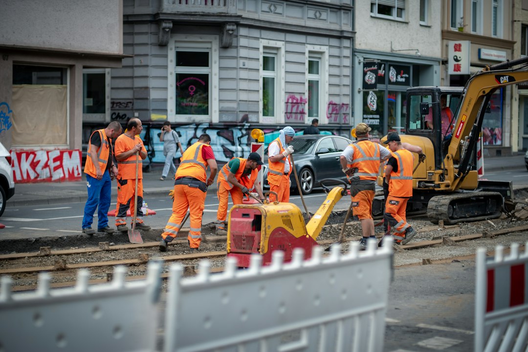 Illustration: daytime road works; not a photograph of the Ben Gurion Boulevard guardrail project in Netanya