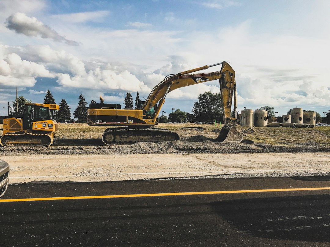 Illustration: excavator at infrastructure works; not a photograph from Ein HaTkhelet, Netanya