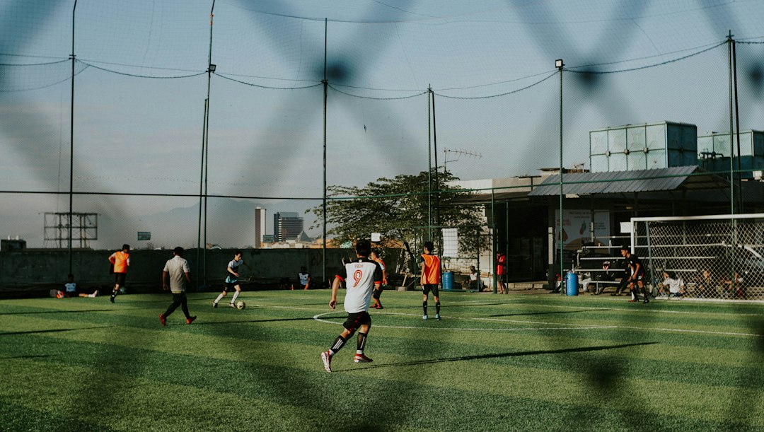 Illustration: young people playing football; not a photograph of the Netanya league. Photo: Falaq Lazuardi / Unsplash.